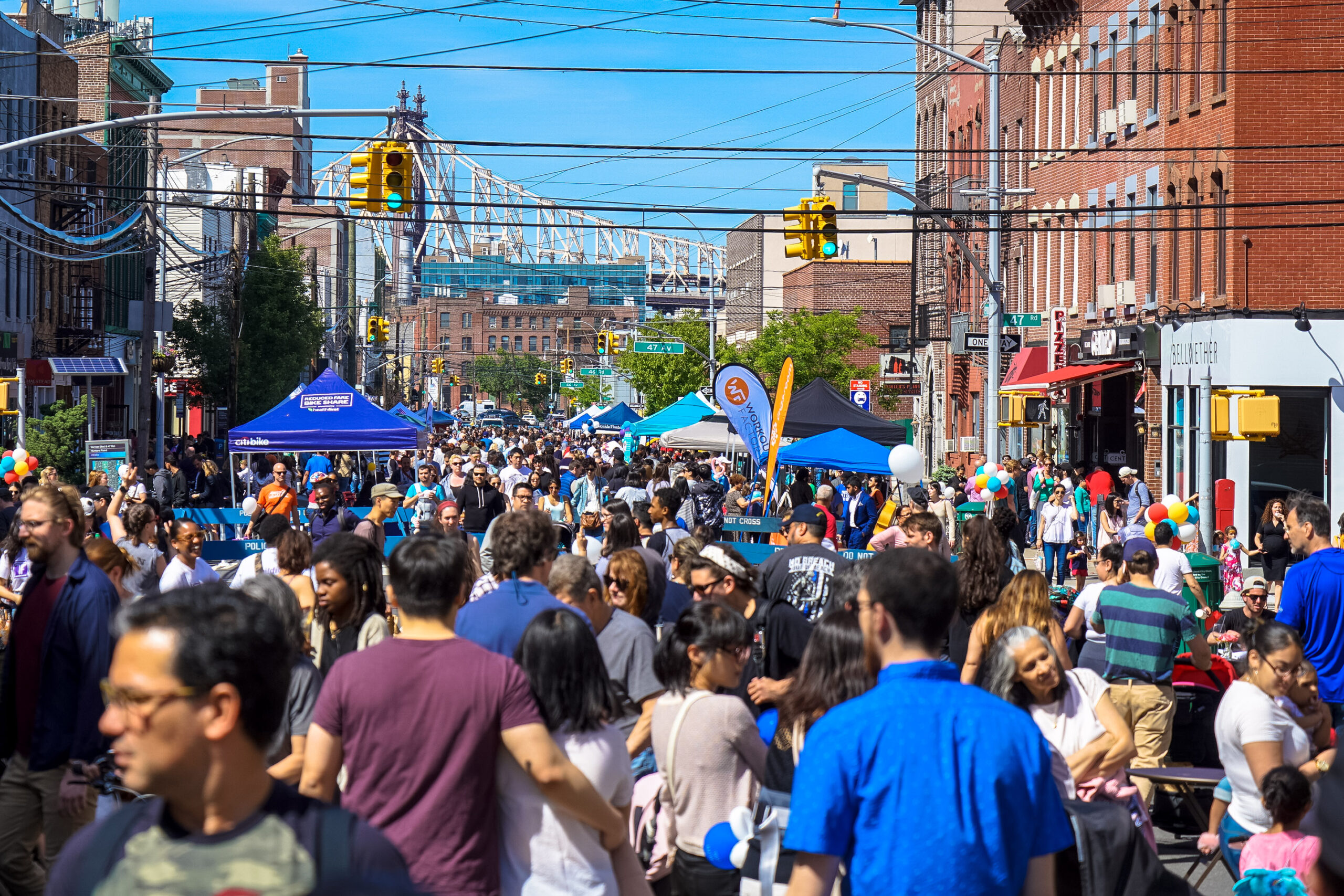 large group of people at a street festival in Long Island City, Queens